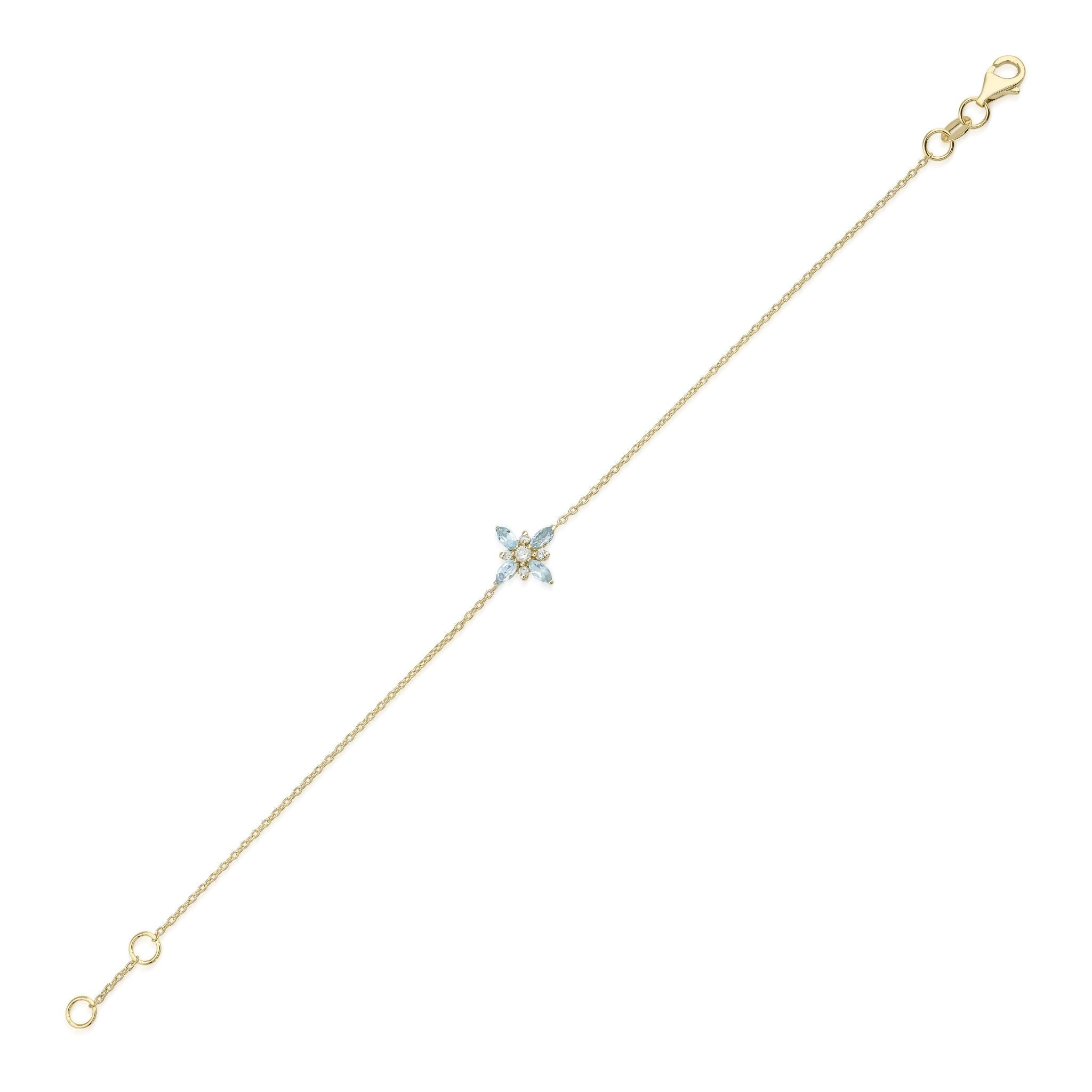 14K gold marquise topaz and diamond bracelet featuring natural gemstones in a delicate design.