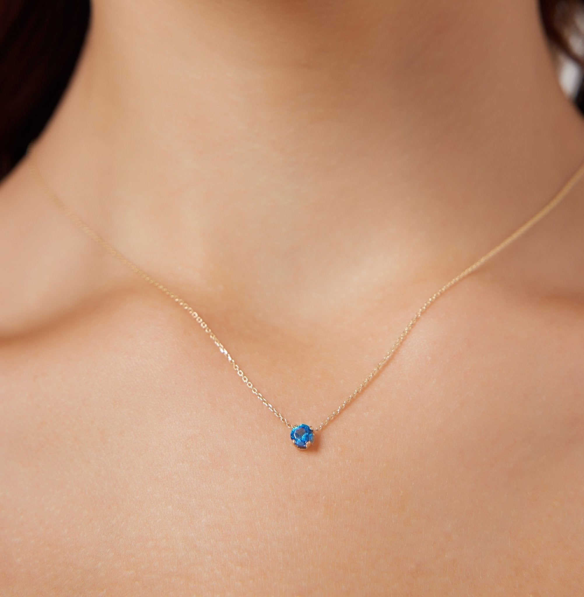 14K white gold minimalist sapphire solitaire necklace in prong setting, perfect for daily wear.