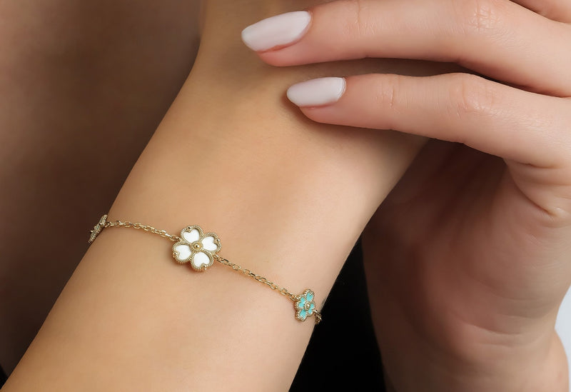 Accessorize in style with this fabulous sterling silver four leaf clover  bracelet! Luxurious and perfect for any special occasion, it's the perfect  way to take your look to the next level. –