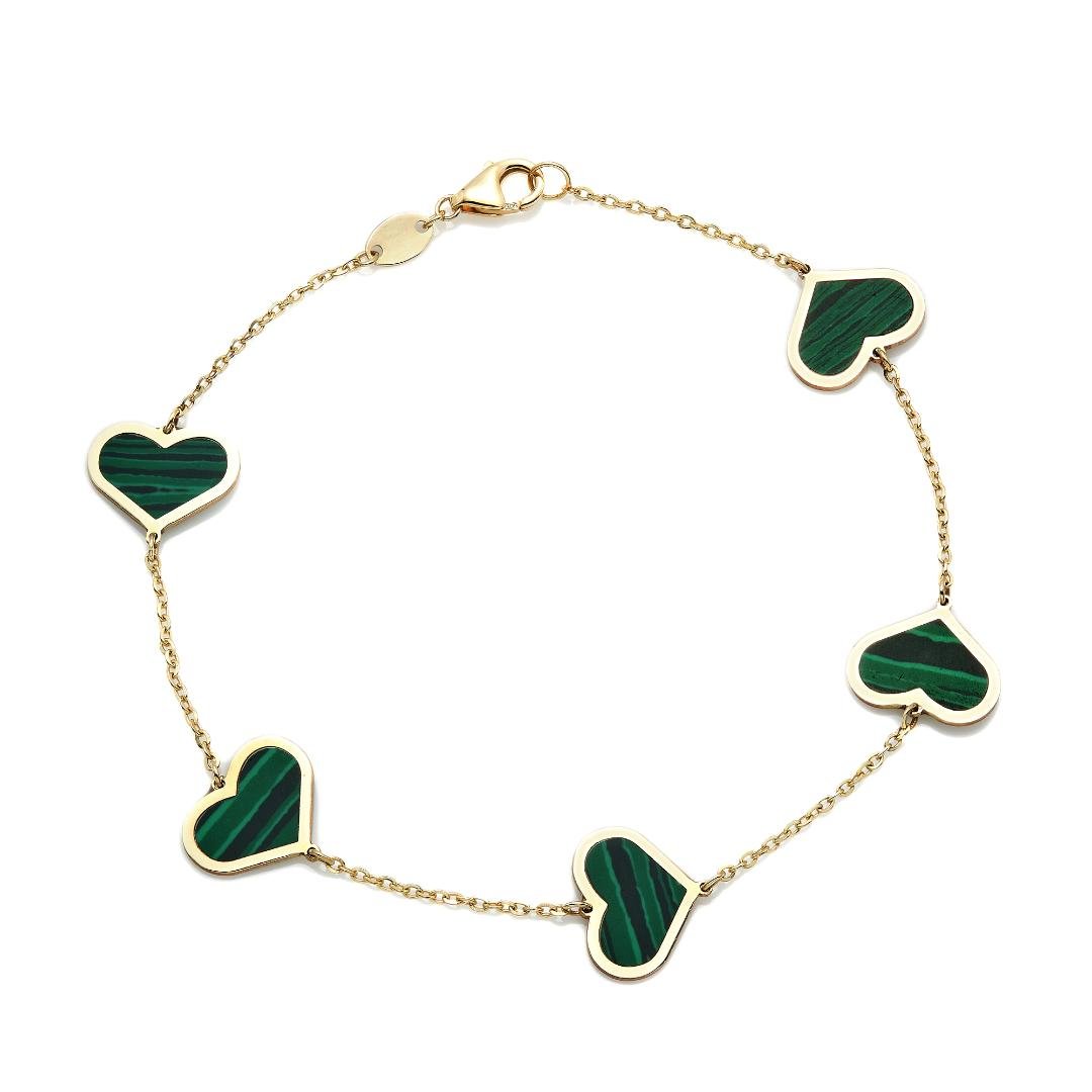 14K solid yellow gold station bracelet featuring five malachite heart charms, elegant and perfect for gifting.