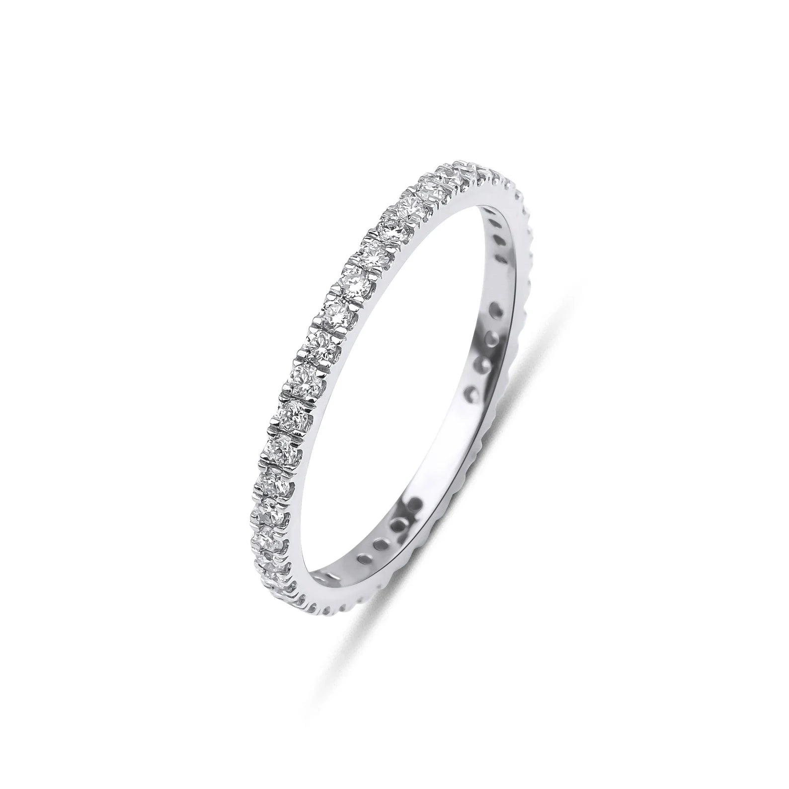 14K white gold diamond wedding band featuring 0.60 carat total weight with 40 sparkling round diamonds in full eternity design.