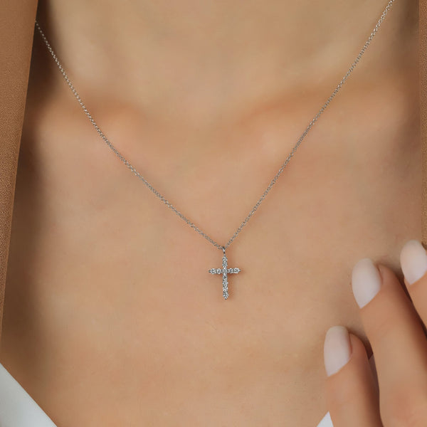 White gold cross with deals diamond in center