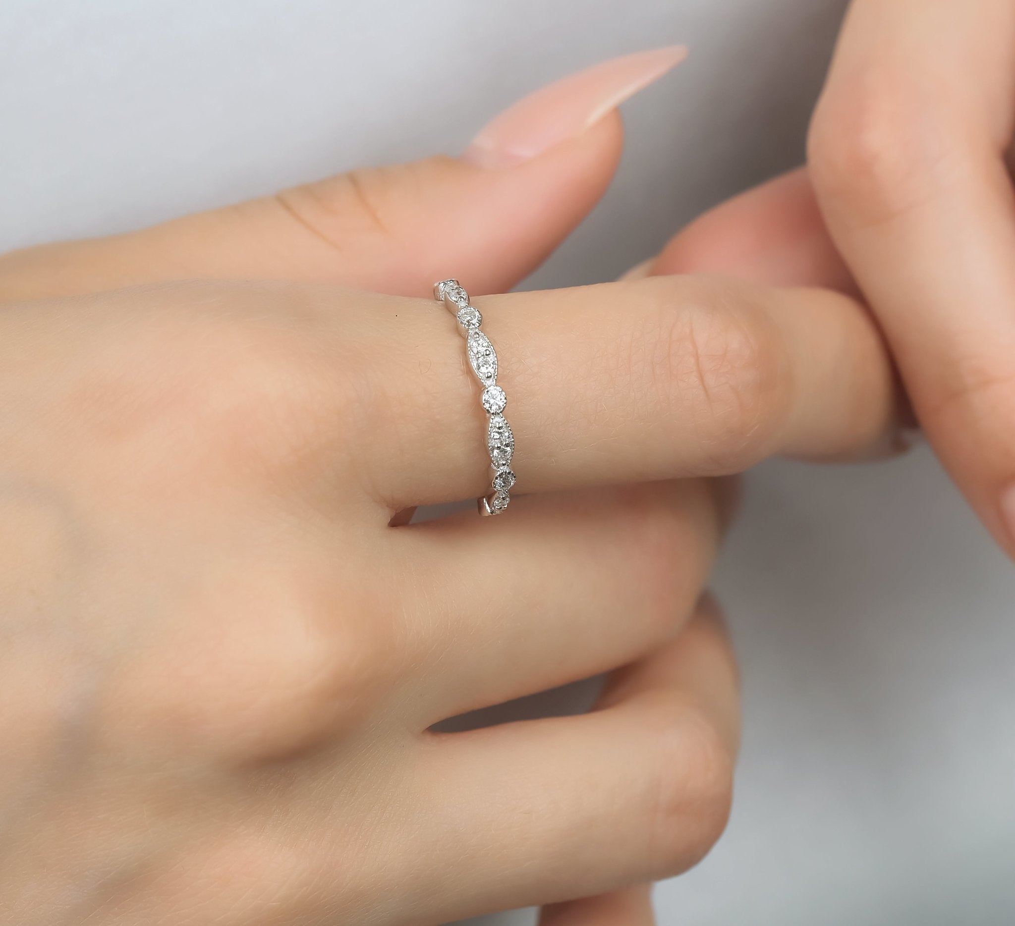 14K white gold minimalist diamond ring featuring 13 round diamonds, perfect for elegant women's jewelry.