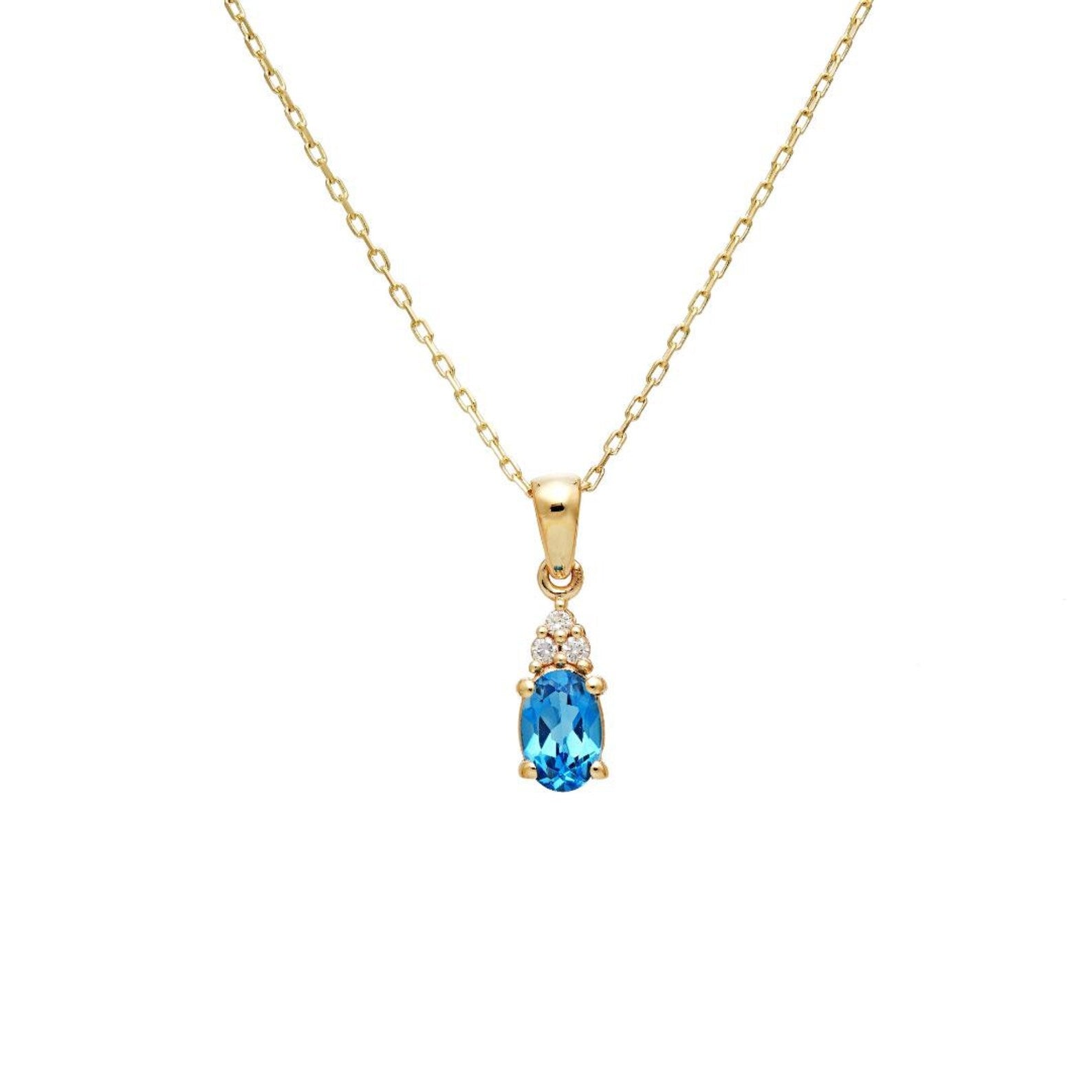 14K yellow gold necklace featuring natural blue topaz solitaire with diamond accents, delicate design, perfect for everyday use.