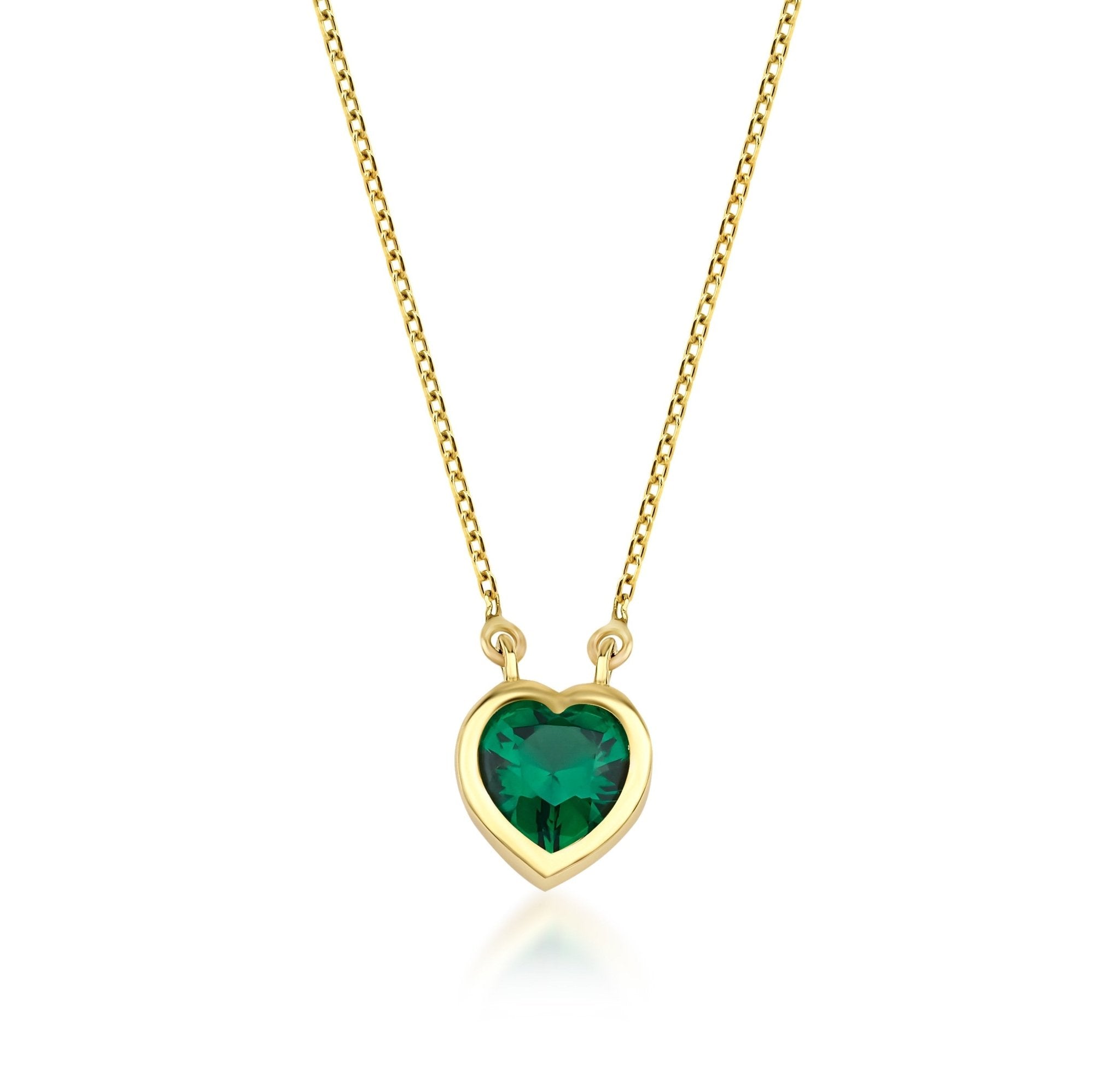 14K yellow gold heart-shaped emerald necklace, lab-created gem, elegant design for everyday wear.