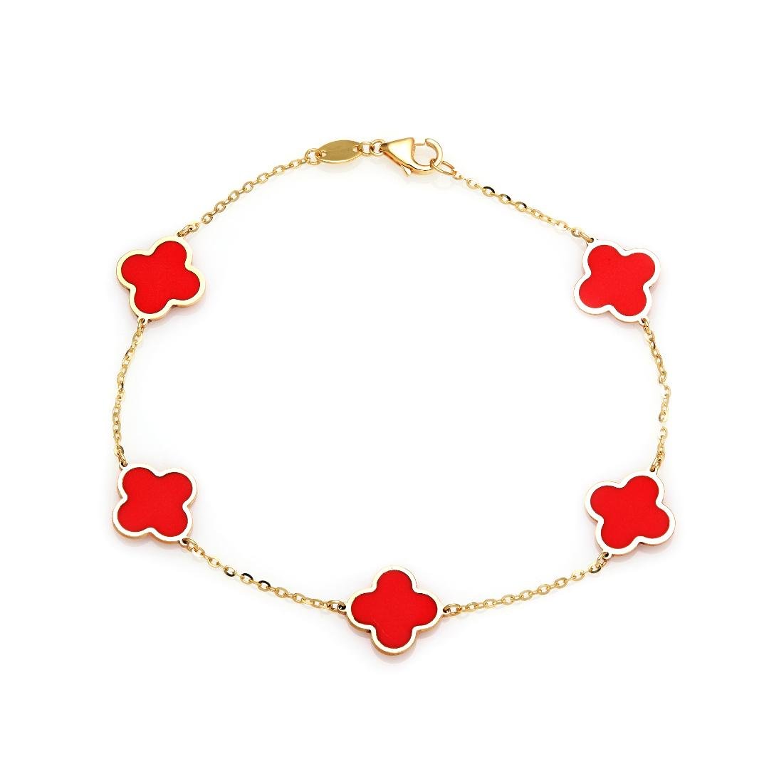 14K solid yellow gold bracelet featuring red coral four leaf clovers, 7 inches with lobster clasp, delicate design.