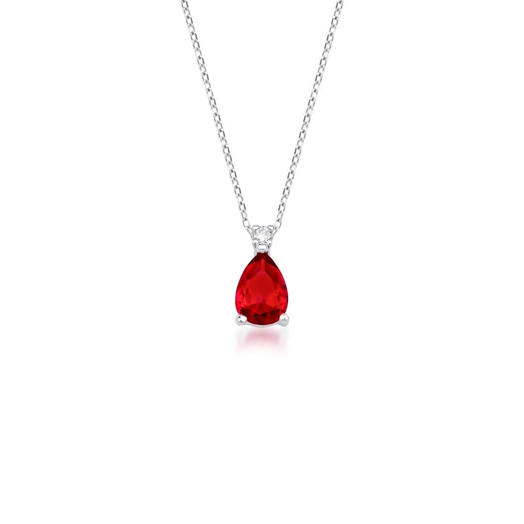 14K yellow gold ruby solitaire necklace with natural diamond accents, perfect for everyday elegance.