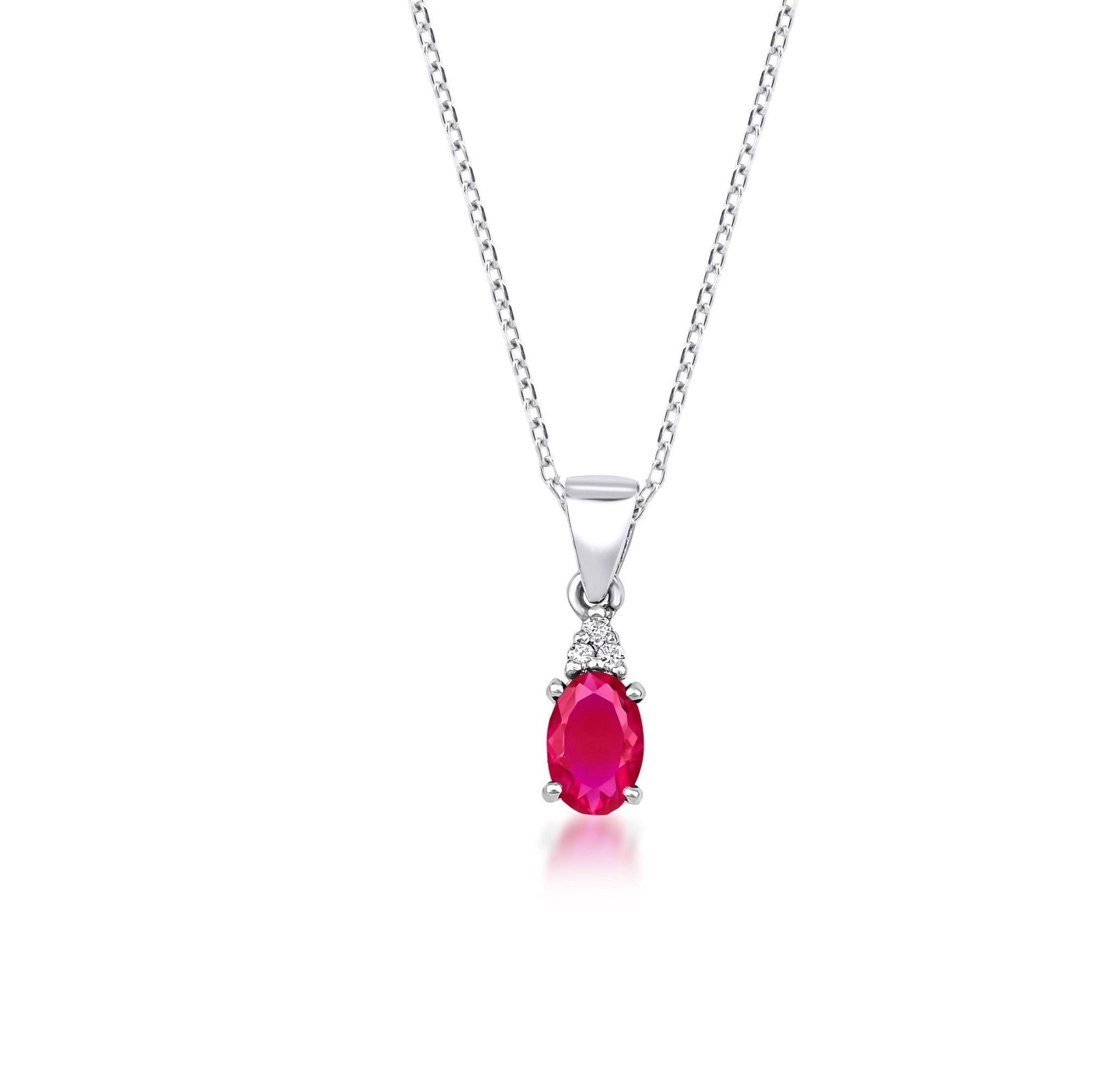 14K white gold necklace featuring a lab-created oval ruby pendant with natural diamonds, perfect for everyday elegance.