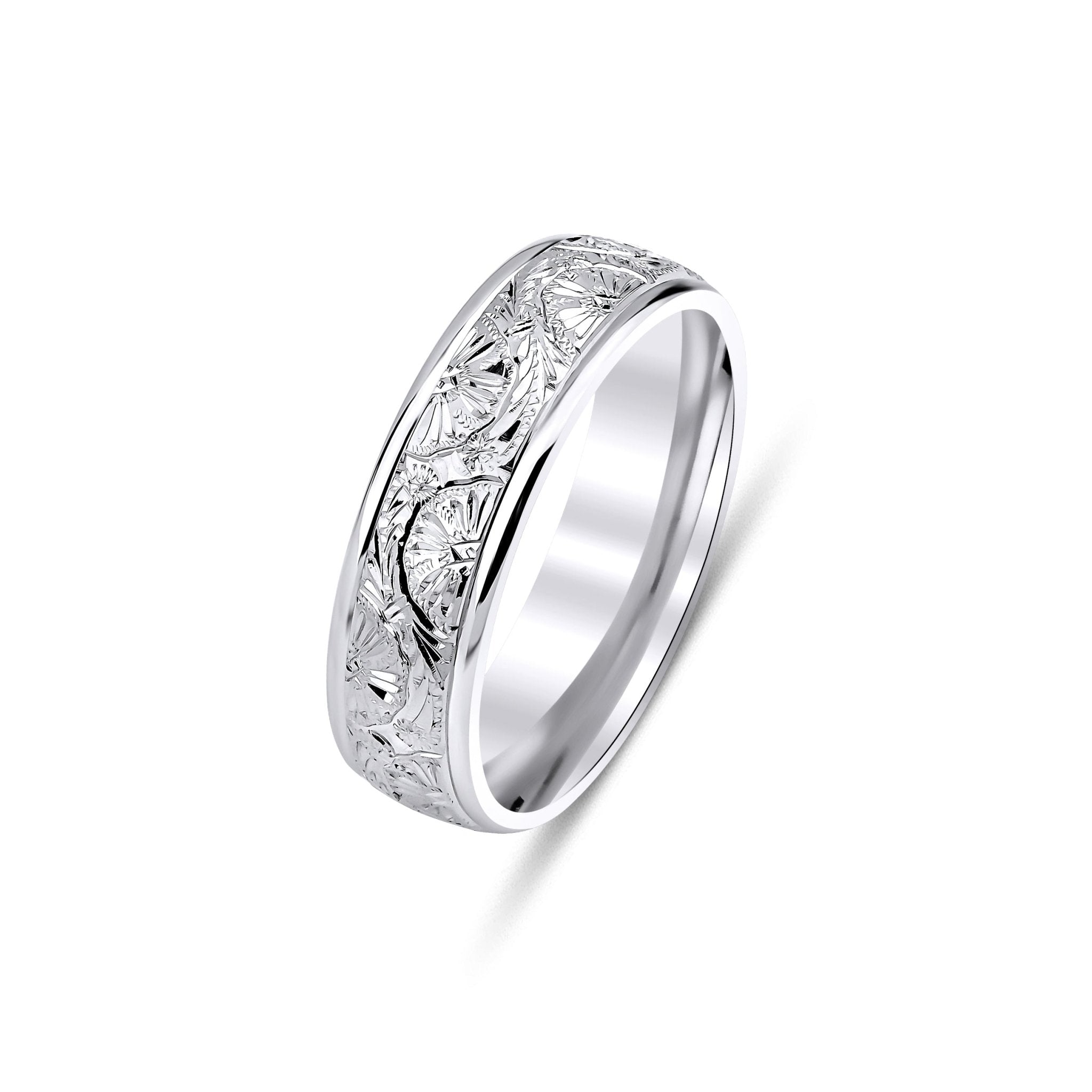 Hand engraved 6mm white gold wedding band with shiny leaf motifs, available in 10K, 14K, and 18K.