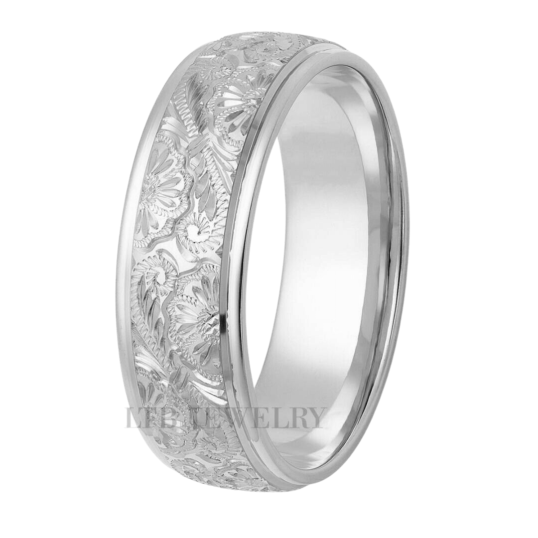 Platinum hand engraved wedding ring with leaf motif, 7mm width, shiny finish, comfort-fit design.