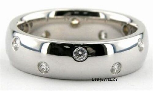 Platinum men's wedding band with round diamonds, 6mm wide, shiny finish, comfort fit, featuring 10 brilliant cut diamonds.